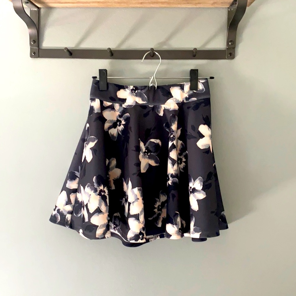 Black floral mini skirt